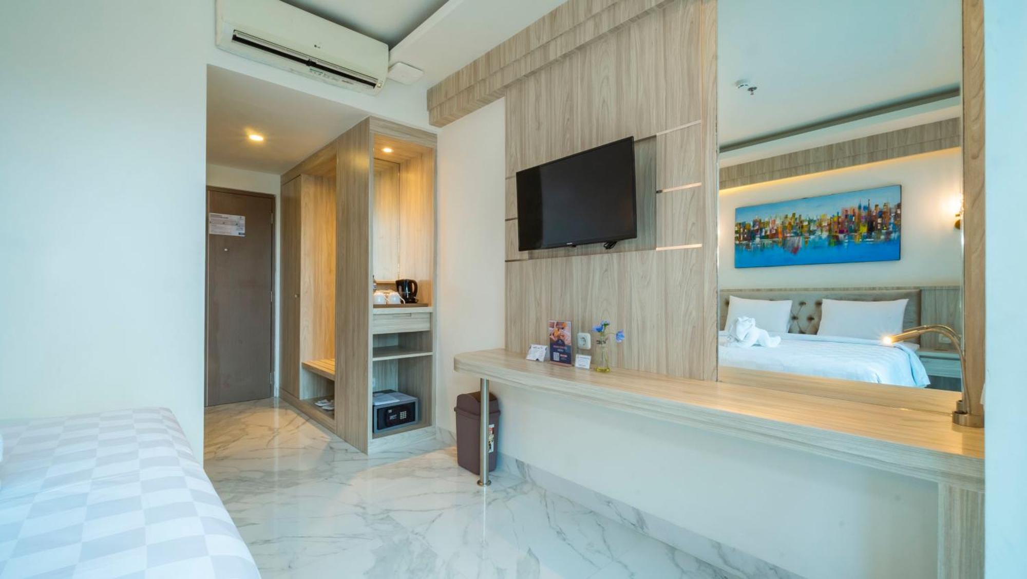 City Of Aventus Hotel - Denpasar 部屋 写真