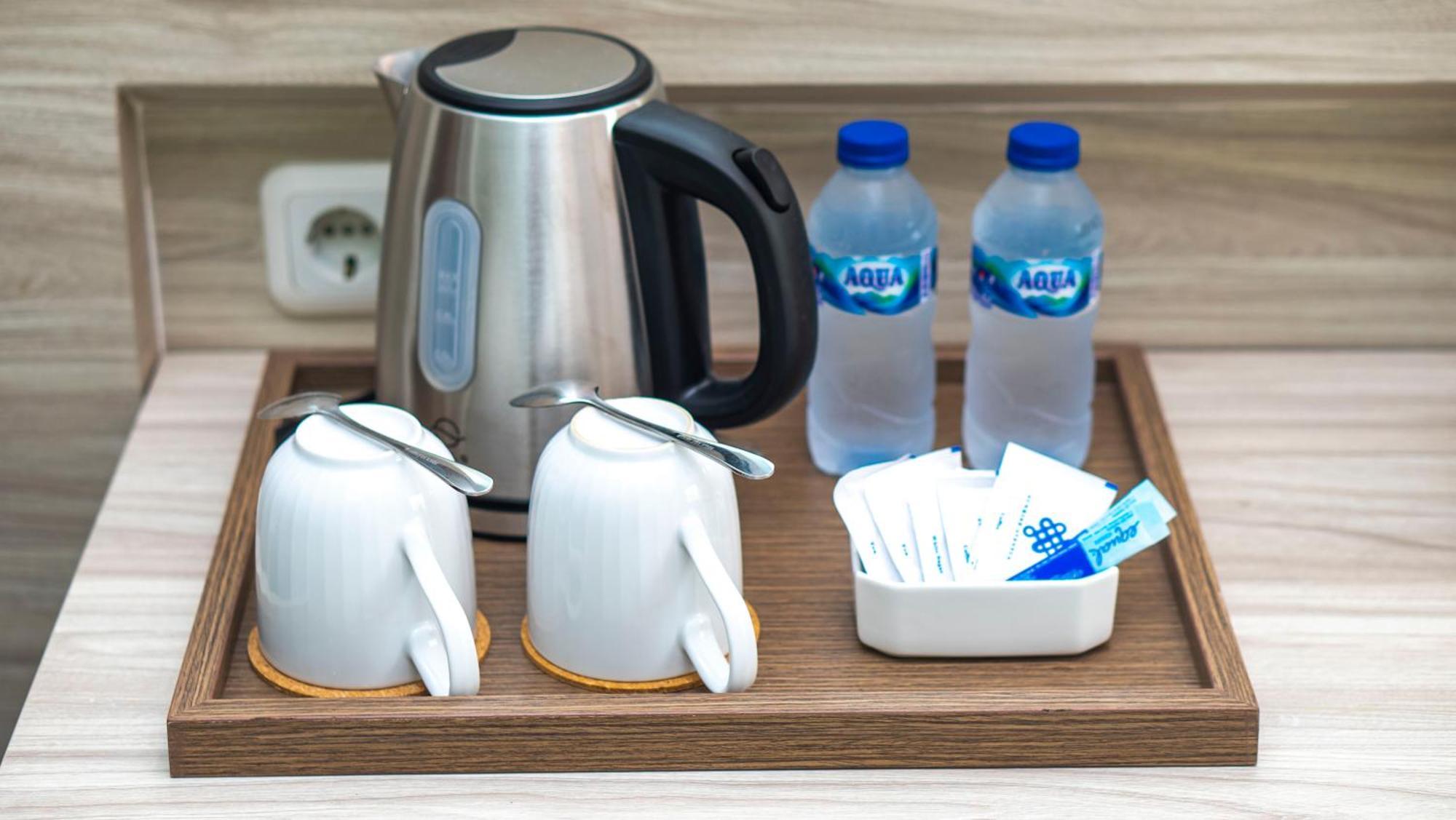 City Of Aventus Hotel - Denpasar 部屋 写真